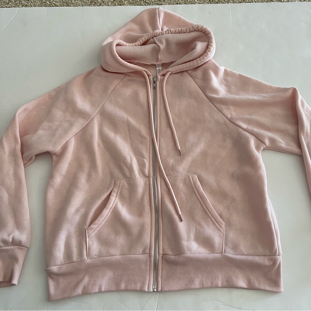 Cozy Pink Zip-Up Hoodie With Front Pockets and Drawstring Hood